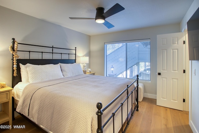 3651 Crown Dancer Dr Unit 8, Pinetop, AZ 85935 - bedroom featuring a ceiling fan, baseboards, and light wood-type flooring