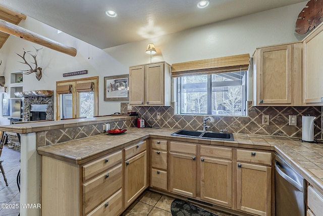 4509 Stone Pine Dr, Pinetop, AZ 85935 - kitchen featuring tile counters, a peninsula, a sink, tasteful backsplash, and recessed lighting