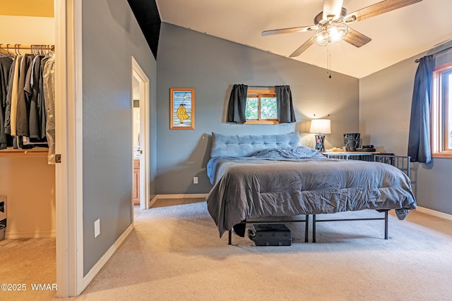 7046 Dusty Saddle Trl, Show Low, AZ 85901 - carpeted bedroom with lofted ceiling, multiple windows, baseboards, and a ceiling fan