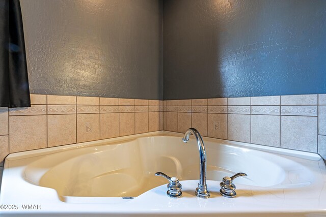 7046 Dusty Saddle Trl, Show Low, AZ 85901 - bathroom featuring a garden tub