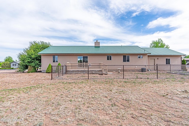 7046 Dusty Saddle Trl, Show Low, AZ 85901 - back of property with metal roof and a chimney