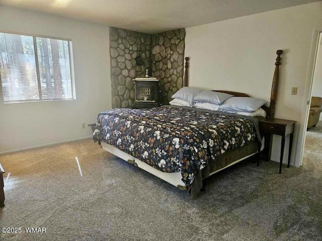 7204 Mark Twain Dr, Pinetop, AZ 85935 - bedroom featuring a wood stove and baseboards