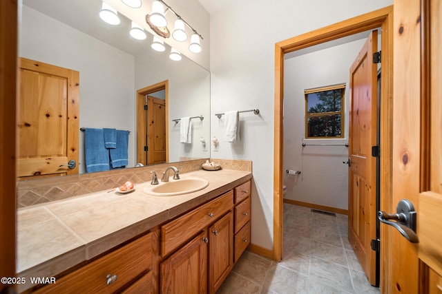 20 W Suncrest Ct, Show Low, AZ 85901 - bathroom with tile patterned flooring, vanity, toilet, baseboards, and visible vents