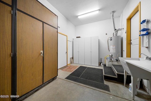 20 W Suncrest Ct, Show Low, AZ 85901 - miscellaneous room featuring gas water heater and concrete floors