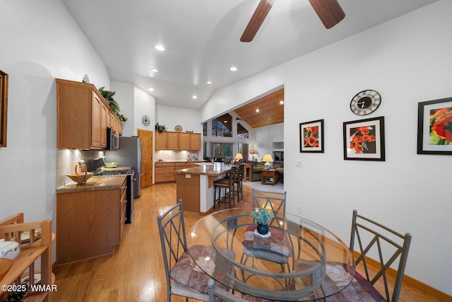 20 W Suncrest Ct, Show Low, AZ 85901 - dining room with recessed lighting, ceiling fan, vaulted ceiling, and light wood-type flooring