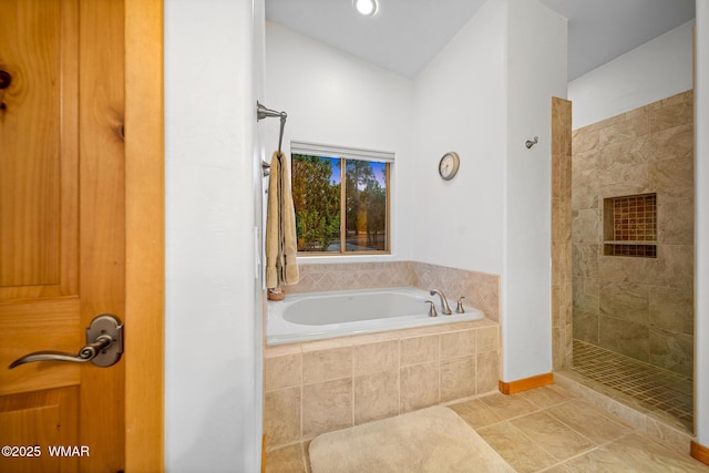 20 W Suncrest Ct, Show Low, AZ 85901 - bathroom with tile patterned floors, a garden tub, and tiled shower