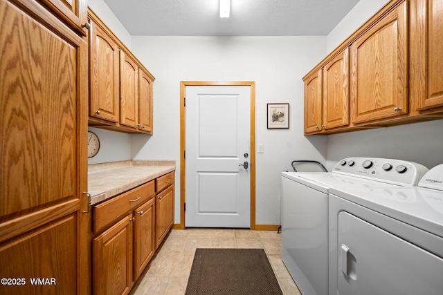 20 W Suncrest Ct, Show Low, AZ 85901 - washroom featuring cabinet space, light tile patterned flooring, baseboards, and washer and clothes dryer
