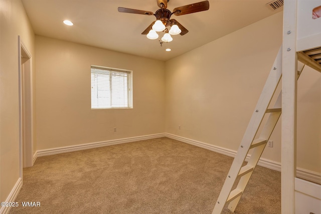 416 S 2nd St, Snowflake, AZ 85937 - unfurnished bedroom with light colored carpet, recessed lighting, baseboards, and a ceiling fan