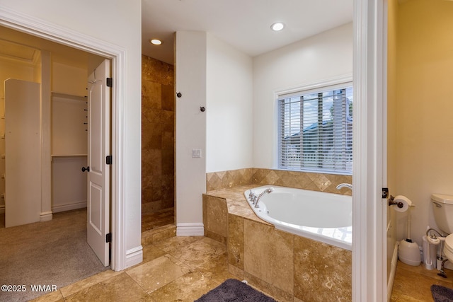 416 S 2nd St, Snowflake, AZ 85937 - bathroom featuring a bath, toilet, tiled shower, and recessed lighting