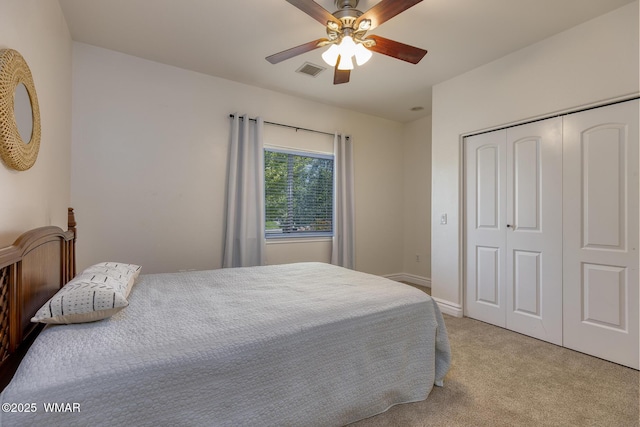 416 S 2nd St, Snowflake, AZ 85937 - bedroom featuring light colored carpet, a closet, a ceiling fan, and baseboards