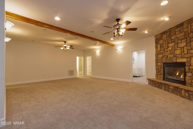 416 S 2nd St, Snowflake, AZ 85937 - unfurnished living room with ceiling fan, a fireplace, light carpet, recessed lighting, and beam ceiling