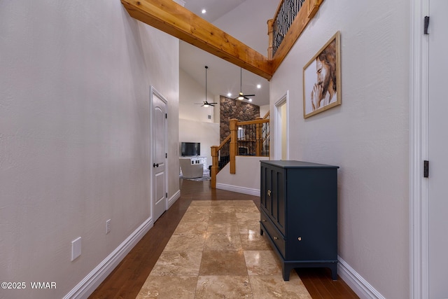 416 S 2nd St, Snowflake, AZ 85937 - corridor featuring stairs, high vaulted ceiling, beam ceiling, and baseboards