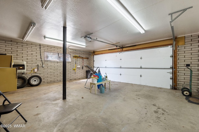 garage featuring heating unit