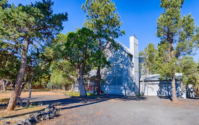 exterior space featuring a chimney