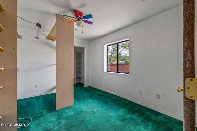 unfurnished bedroom with carpet floors and a ceiling fan