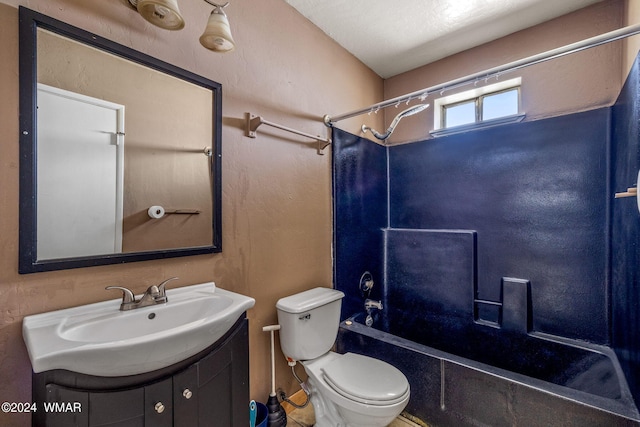 bathroom featuring shower / washtub combination, vanity, and toilet