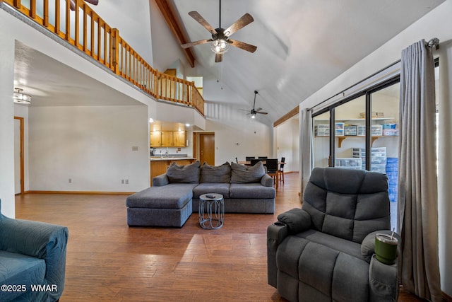 2232 Eagle Ln, Overgaard, AZ 85933 - living room with a ceiling fan, wood finished floors, high vaulted ceiling, and beam ceiling