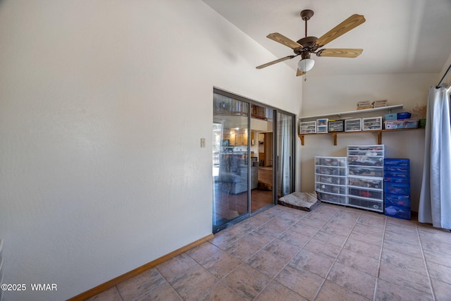 2232 Eagle Ln, Overgaard, AZ 85933 - empty room featuring a ceiling fan and high vaulted ceiling