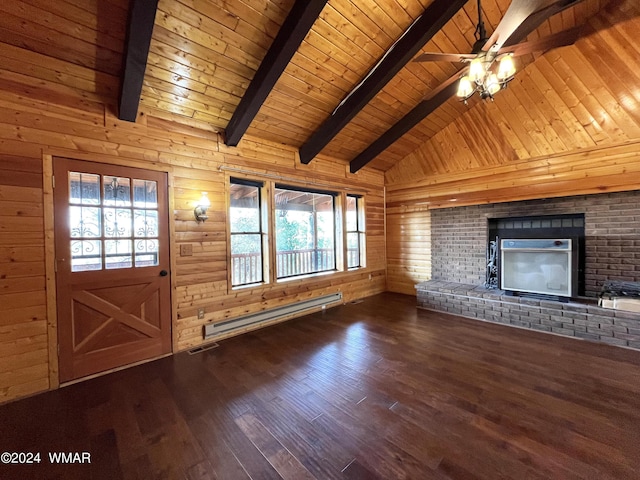 unfurnished living room with wooden walls, wood ceiling, dark wood-style flooring, baseboard heating, and beam ceiling