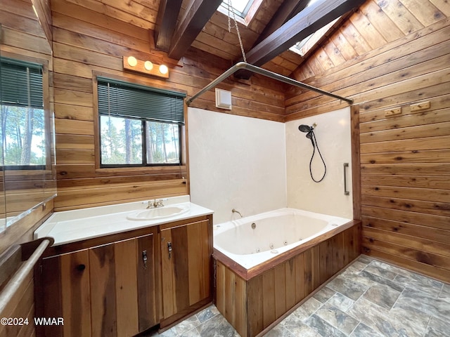 bathroom with stone finish flooring and wood walls