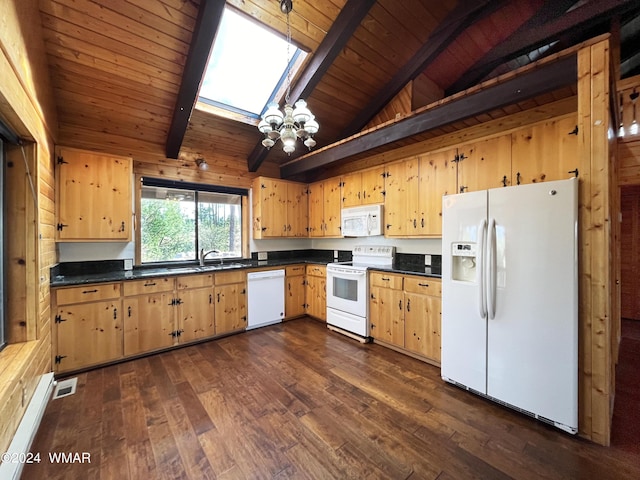 kitchen with dark countertops, white appliances, vaulted ceiling with skylight, and dark wood finished floors