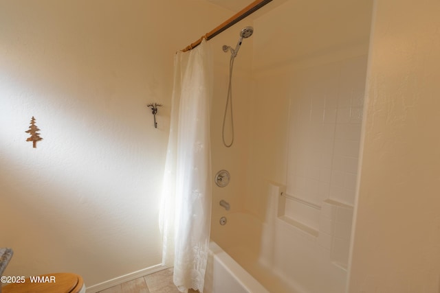 bathroom featuring toilet and shower / bathtub combination with curtain