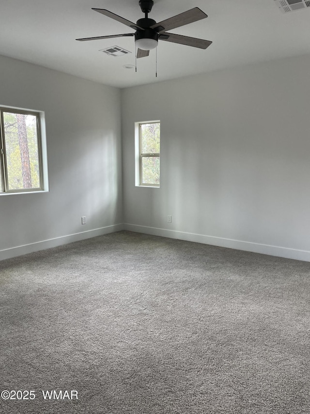 2490 Aspen Run, Pinetop, AZ 85935 - carpeted spare room featuring visible vents, baseboards, and ceiling fan