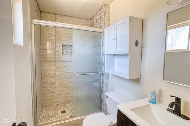 341 W 5th St S, Snowflake, AZ 85937 - bathroom featuring toilet, a stall shower, and vanity