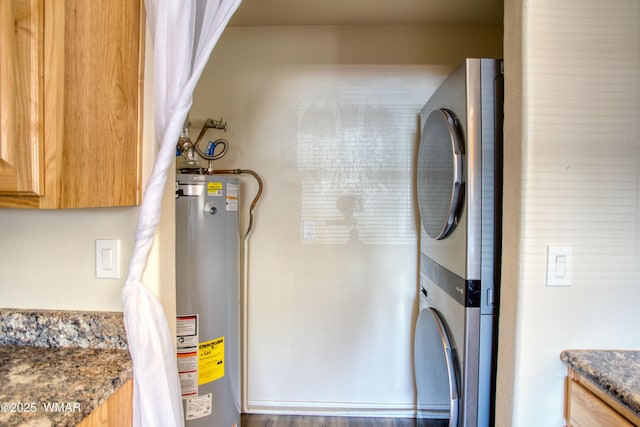 341 W 5th St S, Snowflake, AZ 85937 - washroom with stacked washing machine and dryer and gas water heater