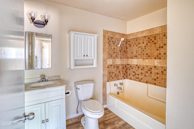 341 W 5th St S, Snowflake, AZ 85937 - bathroom with toilet, shower / washtub combination, vanity, and wood finished floors