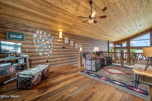 living room with wooden ceiling, hardwood / wood-style flooring, a ceiling fan, and high vaulted ceiling