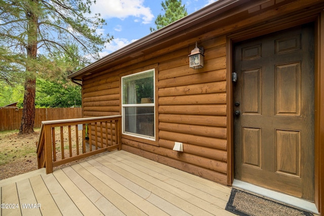 wooden deck featuring fence