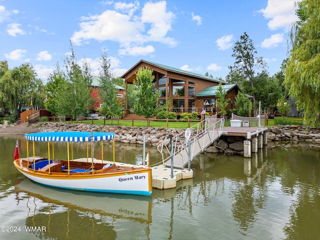 dock area with a water view