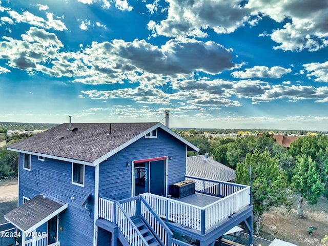 8286 Pinon Dr, Show Low, AZ 85901 - rear view of house with a wooden deck and a shingled roof