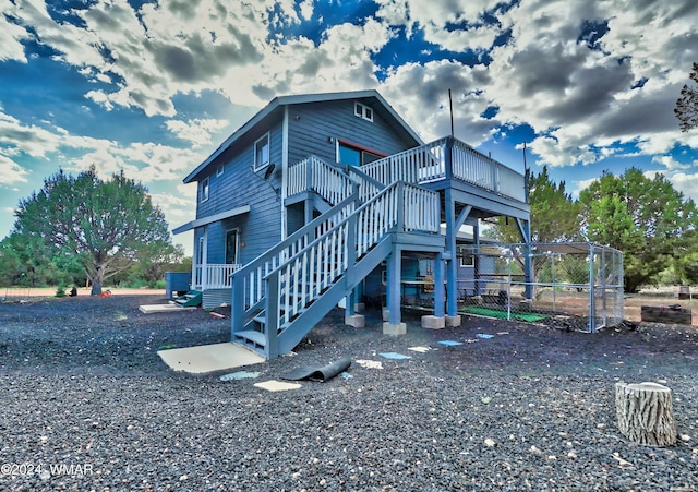 8286 Pinon Dr, Show Low, AZ 85901 - rear view of property featuring a wooden deck and stairs