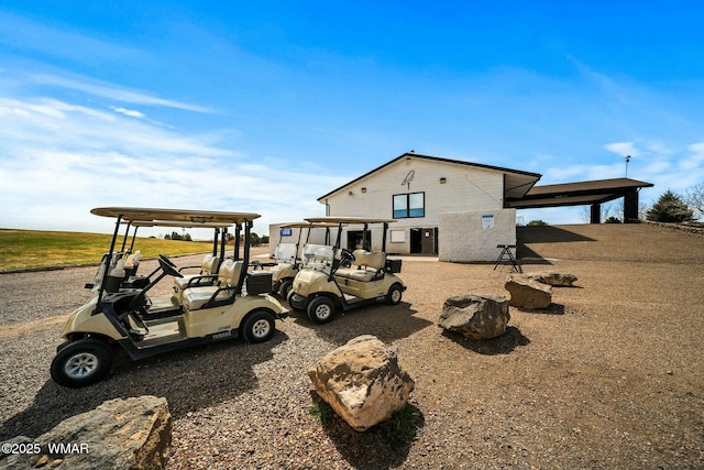 view of front of property with a carport