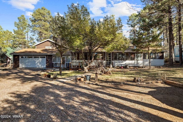 view of front of home with a garage and driveway