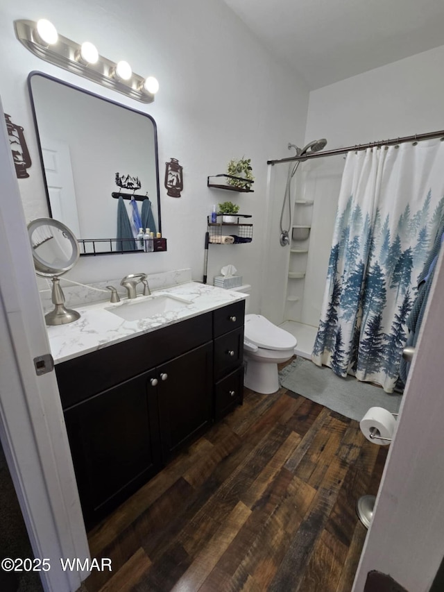 3845 Hidden Ranch Rd, Snowflake, AZ 85937 - full bathroom featuring wood finished floors, toilet, a shower stall, and vanity