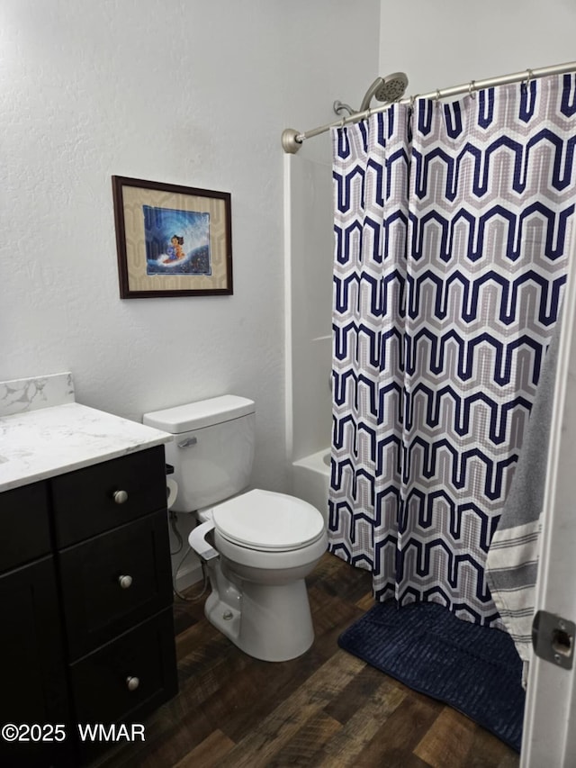 3845 Hidden Ranch Rd, Snowflake, AZ 85937 - bathroom with wood finished floors, toilet, vanity, and shower / bath combo with shower curtain