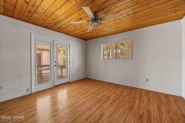 1721 W Huning, Show Low, AZ 85901 - unfurnished room featuring wood ceiling, wood finished floors, ceiling fan, and french doors