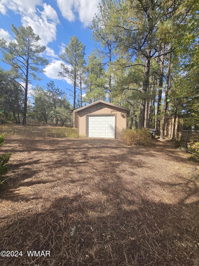 detached garage with driveway