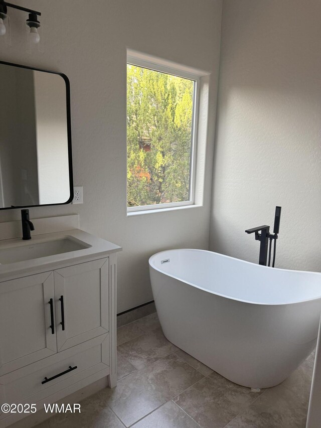 2747 Air Park Dr, Overgaard, AZ 85933 - bathroom featuring vanity and a freestanding bath