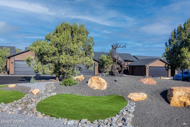 view of front of property with a shingled roof