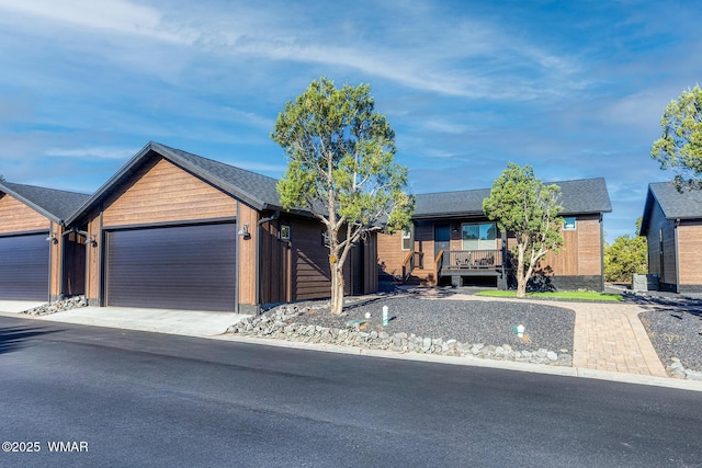 view of front of home featuring an attached garage and driveway