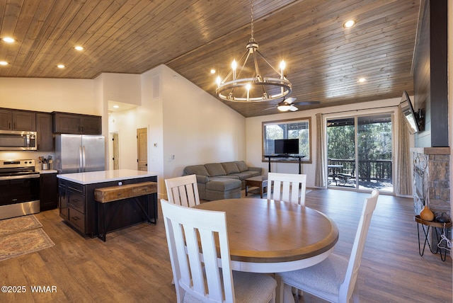 dining room featuring wood ceiling, a chandelier, wood finished floors, recessed lighting, and ceiling fan