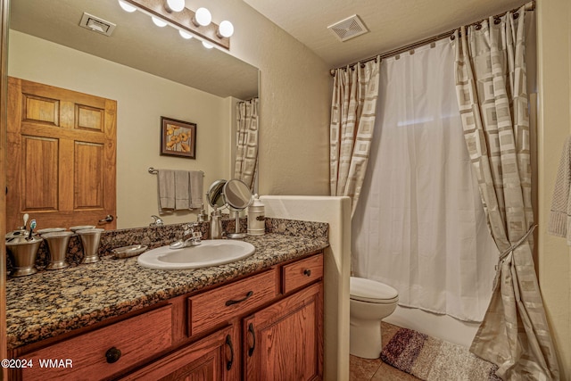 bathroom with shower / bathtub combination with curtain, visible vents, vanity, and toilet