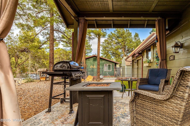 2331 W Rogers Loop, Show Low, AZ 85901 - view of patio with an outdoor fire pit