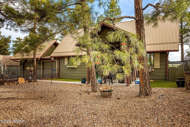 2331 W Rogers Loop, Show Low, AZ 85901 - back of house featuring metal roof