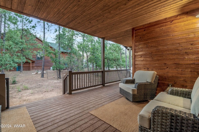 wooden deck with outdoor lounge area