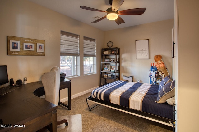 carpeted bedroom with visible vents, ceiling fan, and baseboards